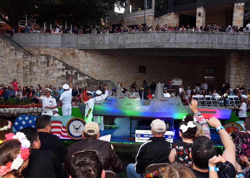 Naval Medical Forces Support Command, USS San Antonio participate in Texas Cavaliers River Parade during Fiesta