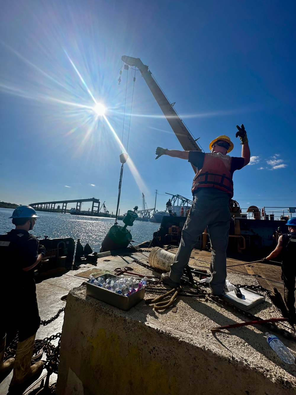 Coast Guard sets buoys in in preparation for opening of limited access channel