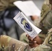 A Soldier Reads a Pamphlet for a Change of Responsibility