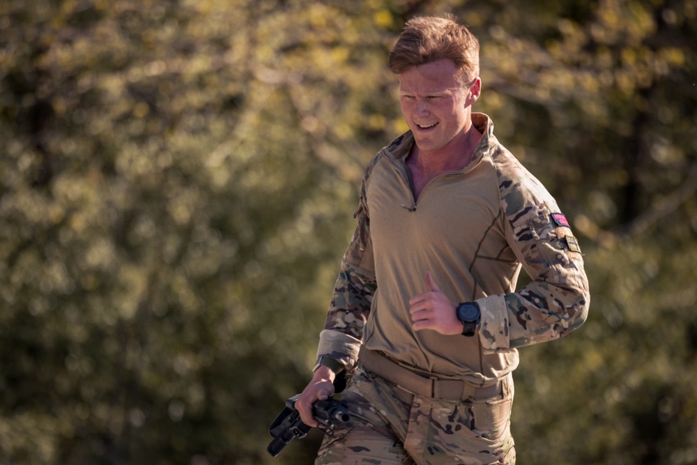 U.S. Marines and Royal Marines compete in a modified Biathlon during the 2024 Fittest Instructor Competition