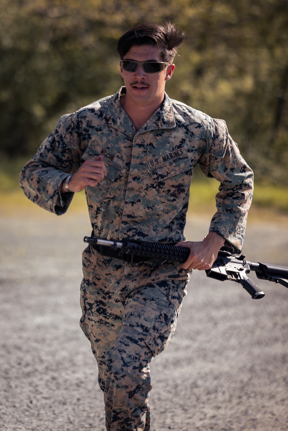 U.S. Marines and Royal Marines compete in a modified Biathlon during the 2024 Fittest Instructor Competition