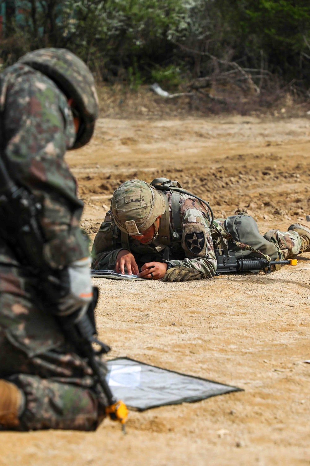 Soldiers train for the Expert Soldier, Infantry, Medical Badge.