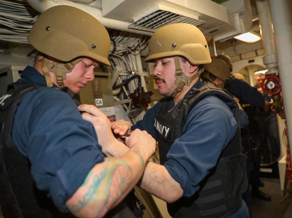 Sailors aboard the USS Howard conduct an anti-terrorist drill in the South China Sea