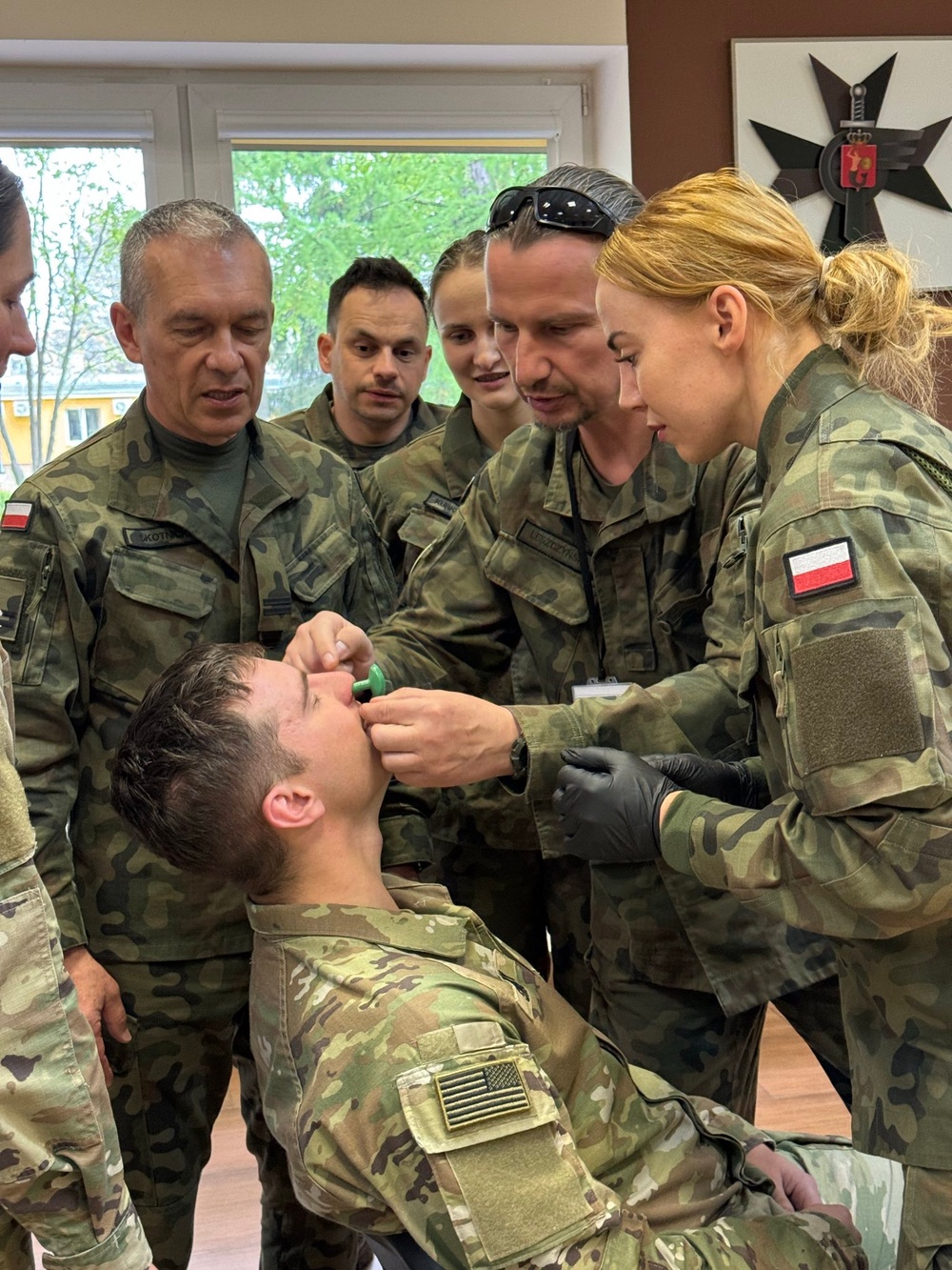 3rd ID and Civil Affairs team up to teach combat lifesaver course to Polish soldiers
