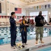 An NTAG Sailor assists students at NJ/NY Regional SeaPerch Competition