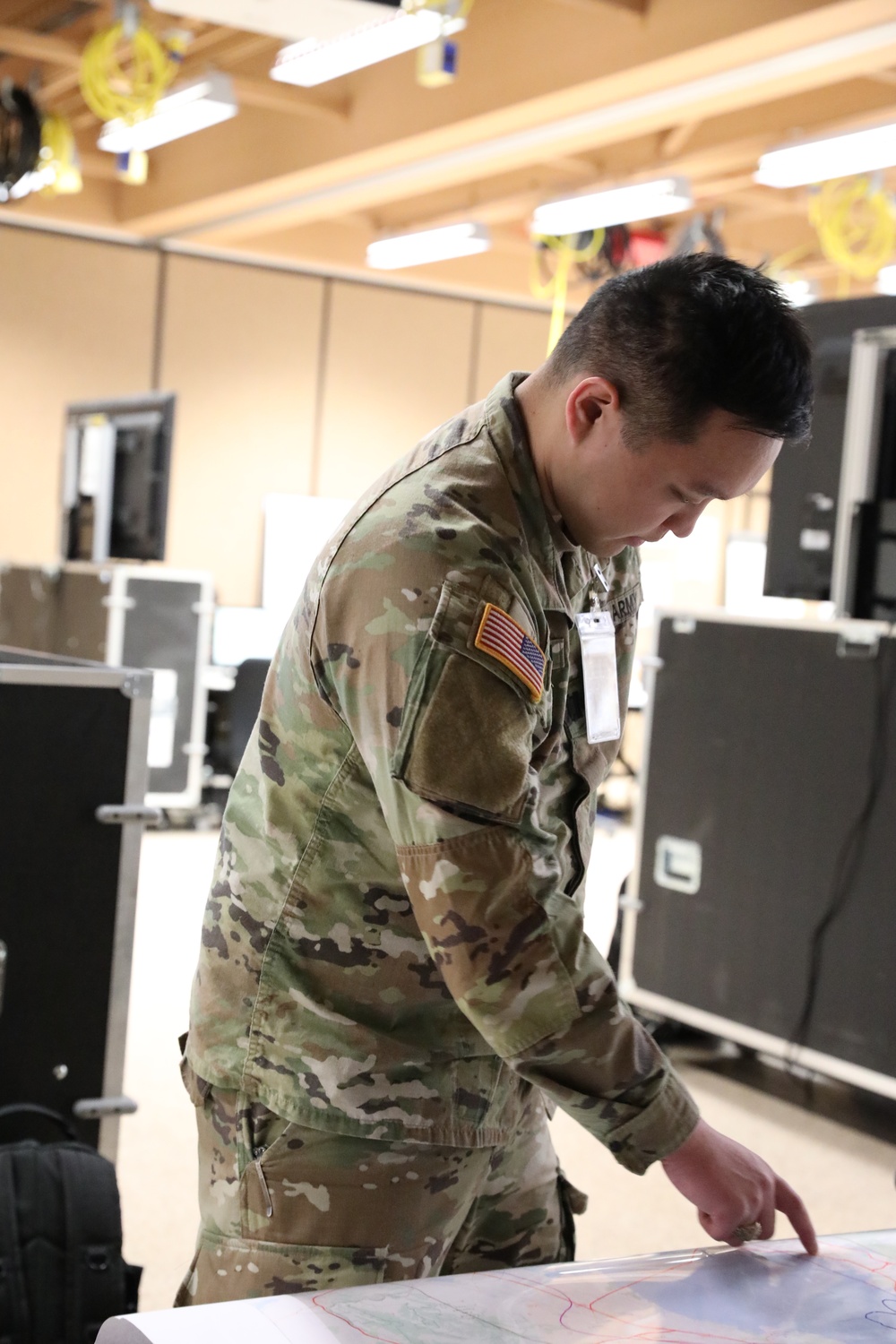 U.S. Army Soldier Maps Out Logistics Operations during Vibrant Response 24