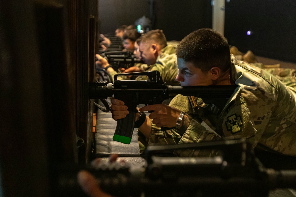 1st Lt. Susan Janfrancisco fires a simulation rifle