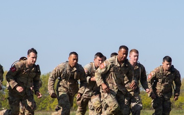 10th Mountain Soldiers participate in the X-Mile Run on Day 4 of the 2024 Best Sapper Competition