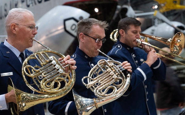 Maj. Gen. Mark V. Slominski joins the Air Force Band of Flight on the French horn.