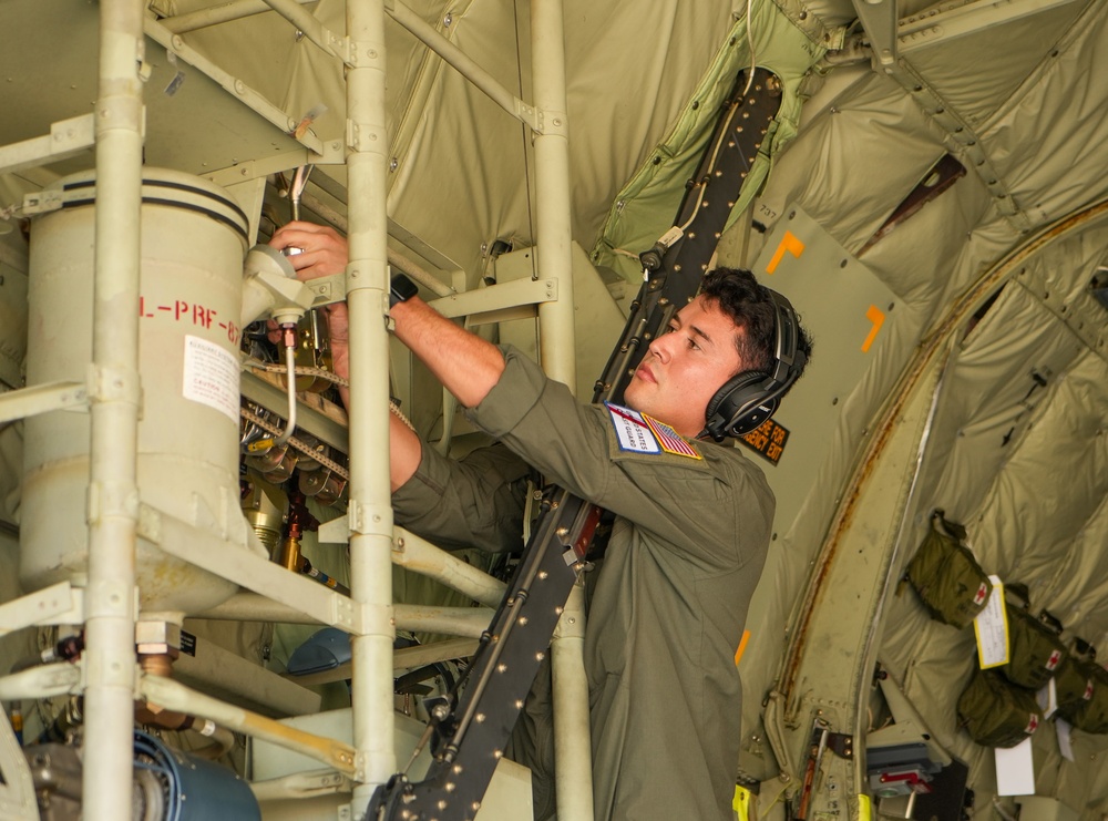 U.S. Coast Guard Air Station Barbers Point and U.S. Coast Guard Aids to Navigation Team Honolulu prepare a flight to Maui