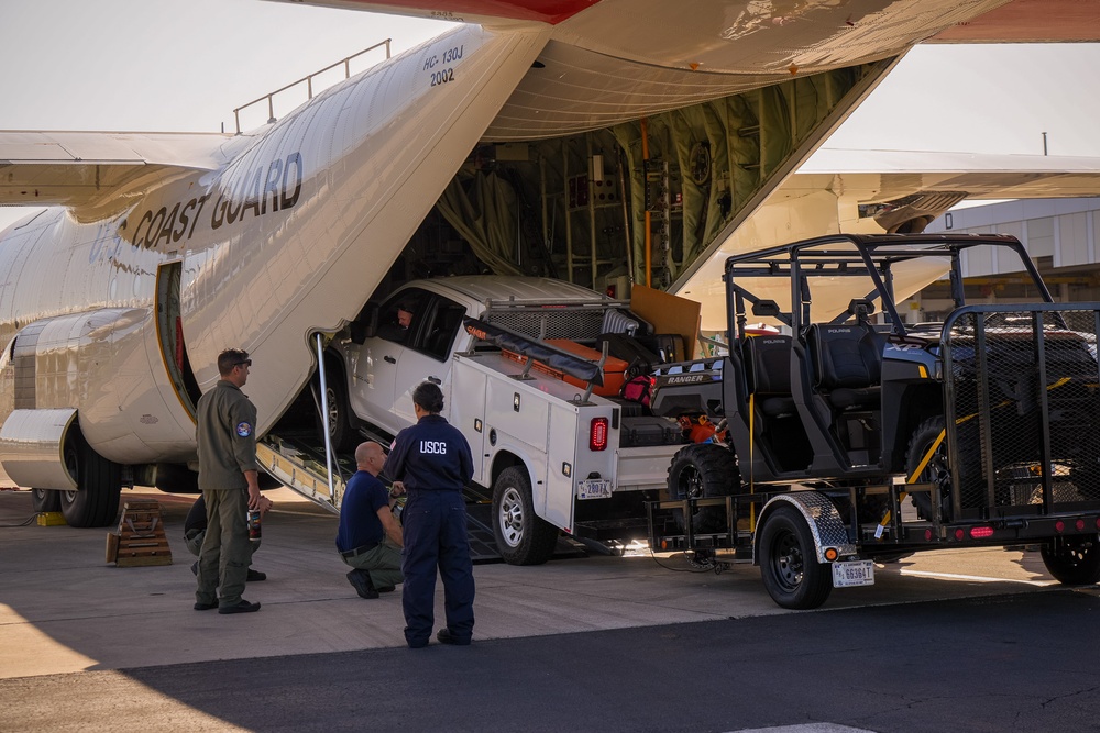 U.S. Coast Guard Air Station Barbers Point and U.S. Coast Guard Aids to Navigation Team Honolulu prepare a flight to Maui