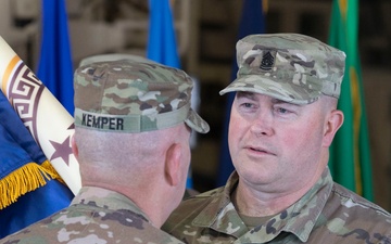 40th and 34th Infantry Divisions pass Task Force Spartan torch