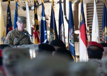 40th and 34th Infantry Divisions pass Task Force Spartan torch