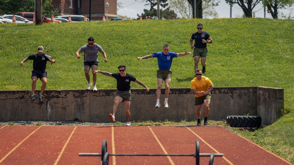 U.S. Marines and Royal Marines compete in the Double-up competition during the 2024 Fittest Instructor Competition