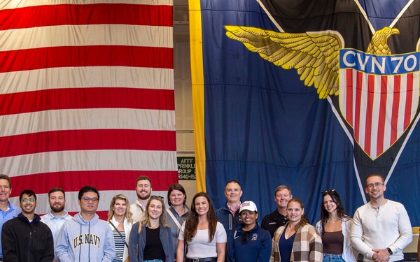 Members of Deloitte Counseling take a tour of Nimitz-class aircraft carrier USS Carl Vinson (CVN 70)