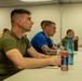 U.S. Marines and Royal Marines attend an aerobic capacity class during the 2024 Fittest Instructor Competition