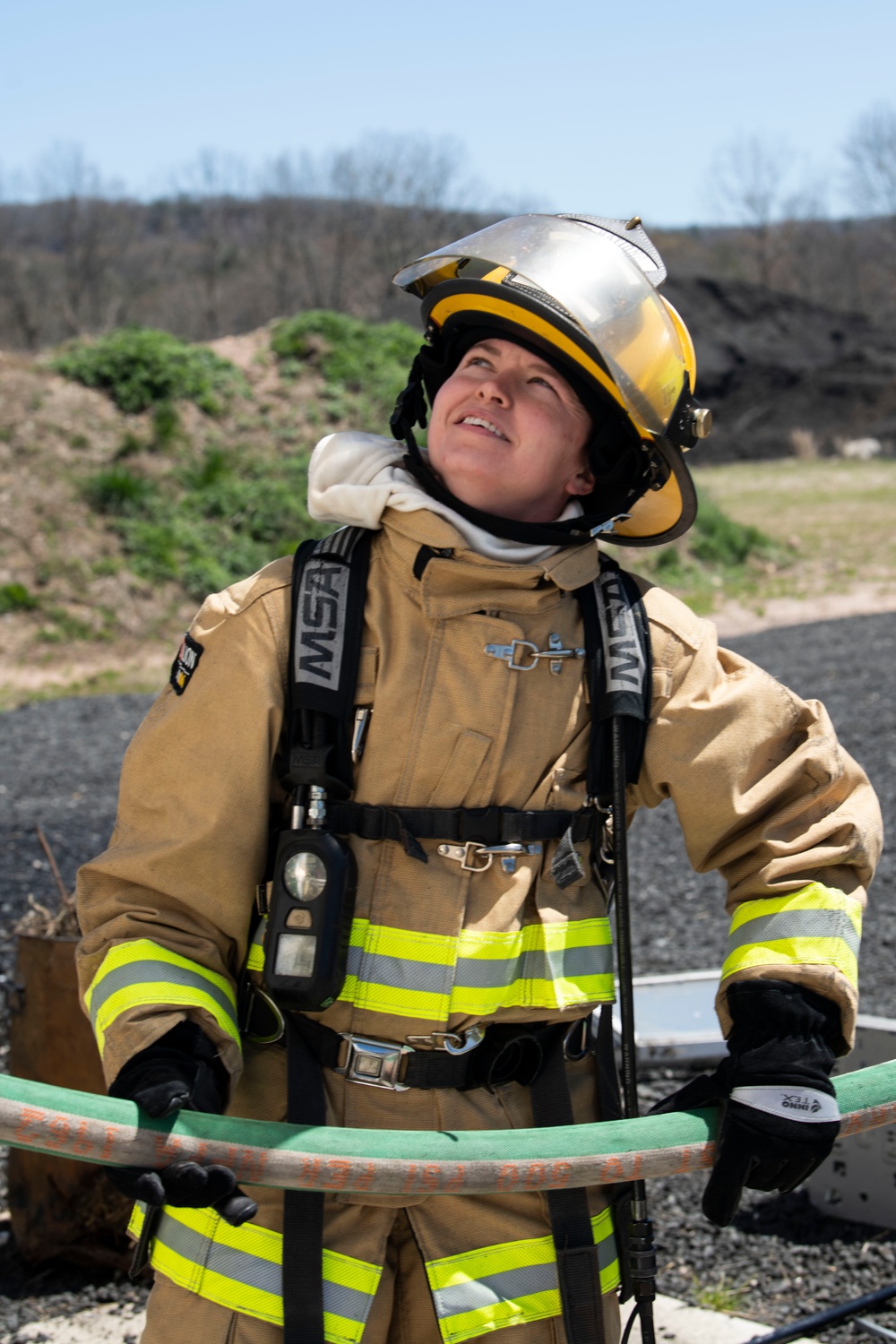 104th Fighter Wing firefighters are tested during a live fire training