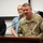 General responds to questions during a mock press release