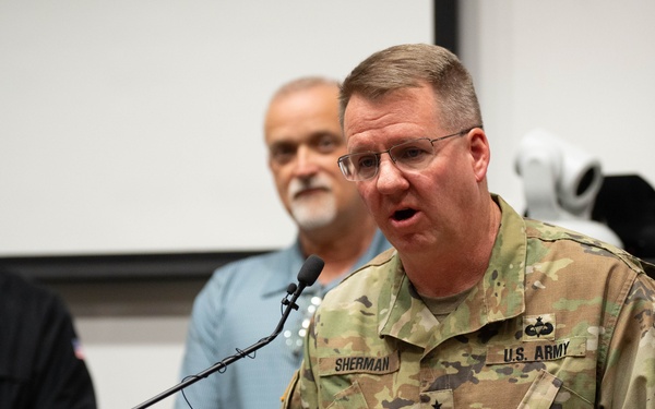 General responds to questions during a mock press release