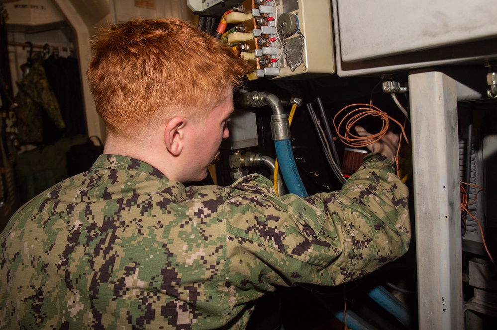 USS Ronald Reagan (CVN 76) Sailors conduct daily operations