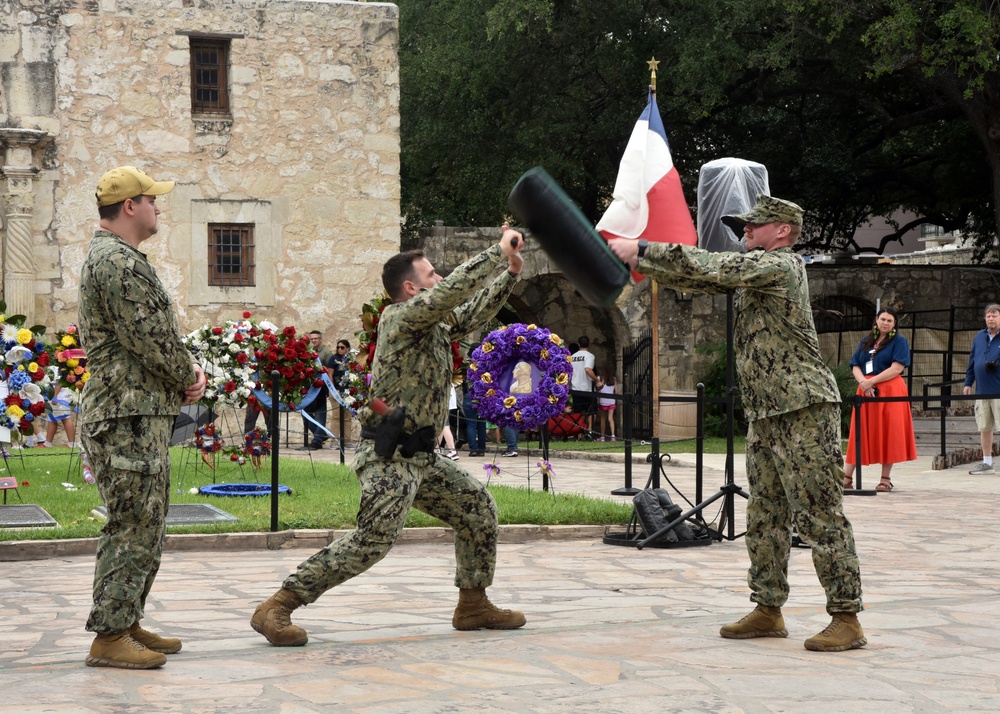 Master-at-Arms Sailors perform demonstrations at Navy Day at the Alamo