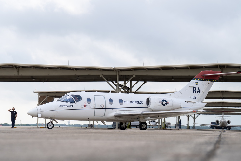 T-1 Jayhawk Memorializing Maj. Jeff Ausborn flys to the Boneyard