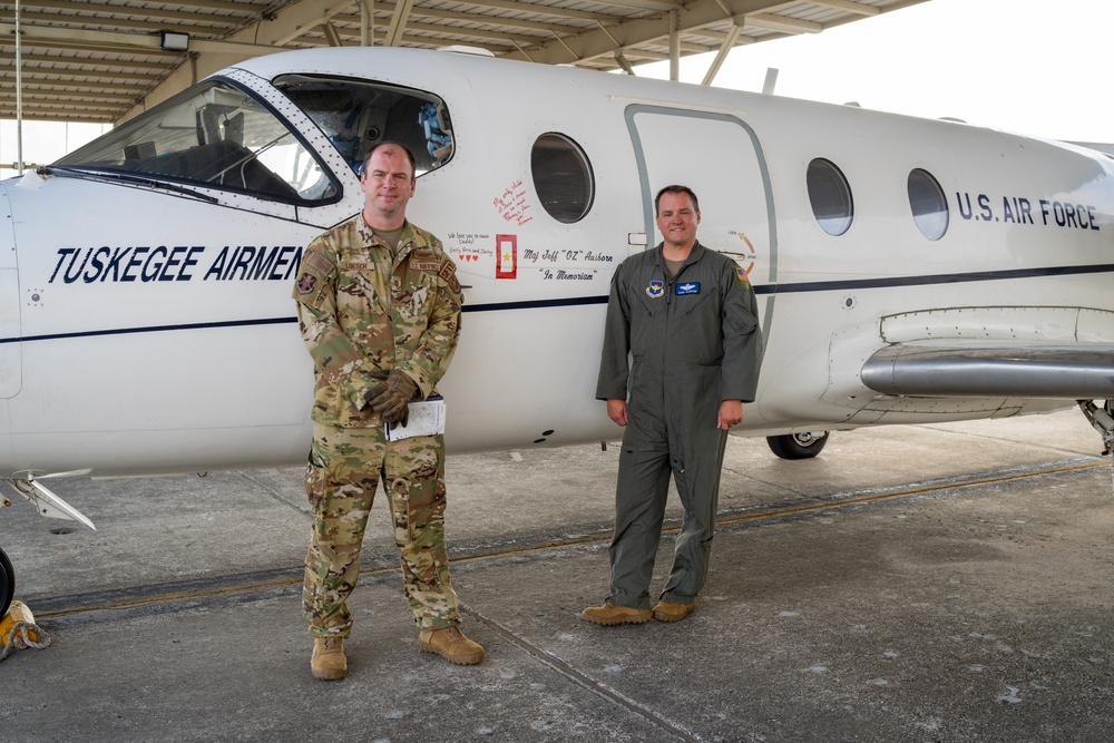 T-1 Jayhawk Memorializing Maj. Jeff Ausborn flys to the Boneyard