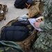 U.S. Navy sailors return deployment gear