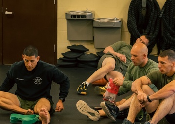 U.S. Marines and Royal Marines attend a coaching class during the 2024 Fittest Instructor Competition