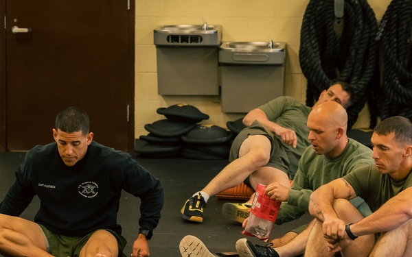U.S. Marines and Royal Marines attend a coaching class during the 2024 Fittest Instructor Competition