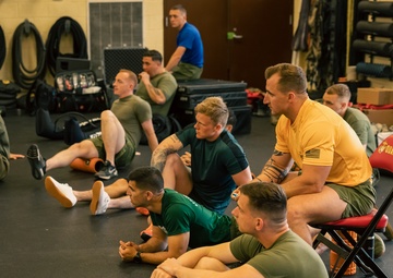 U.S. Marines and Royal Marines attend a coaching class during the 2024 Fittest Instructor Competition