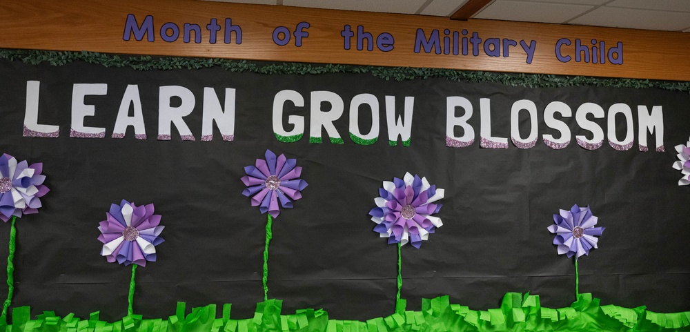 Team Minot holds clap-in for elementary school students for Month of the Military Child