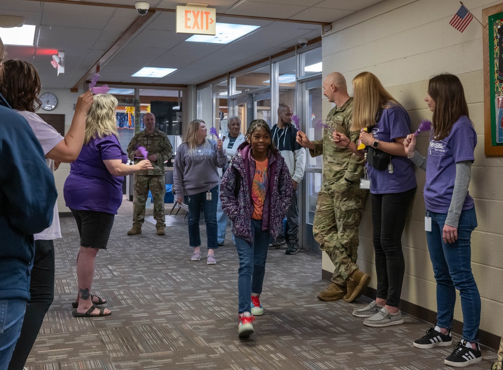 Team Minot holds clap-in for elementary school students for Month of the Military Child