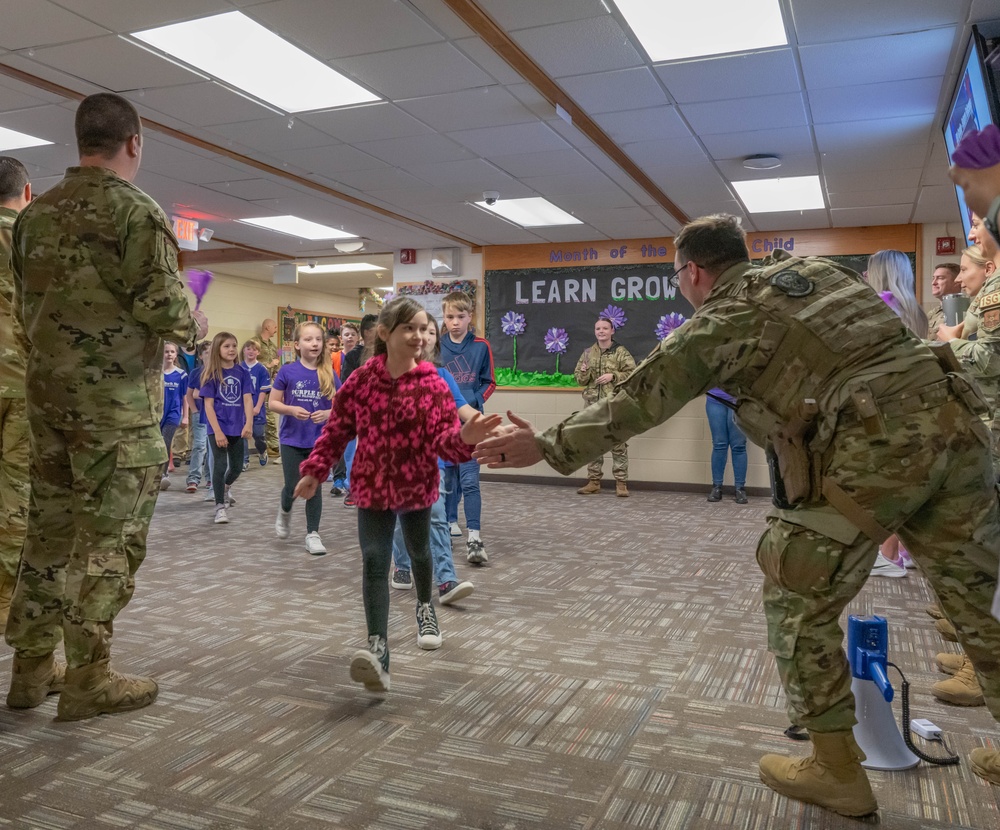 Team Minot holds clap-in for elementary school students for Month of the Military Child