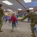 Team Minot holds clap-in for elementary school students for Month of the Military Child