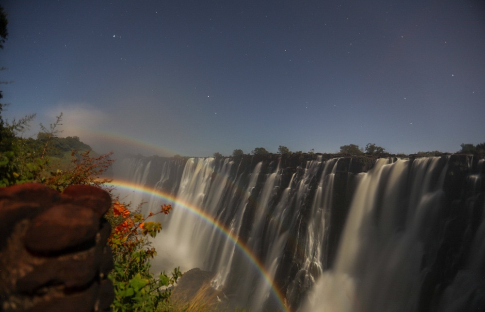 Lunar rainbow shines over Victoria Falls