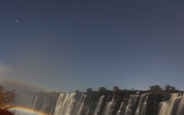 Lunar rainbow shines over Victoria Falls