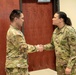 Capt. Takahashi Receives Coin From Col. McGonegal