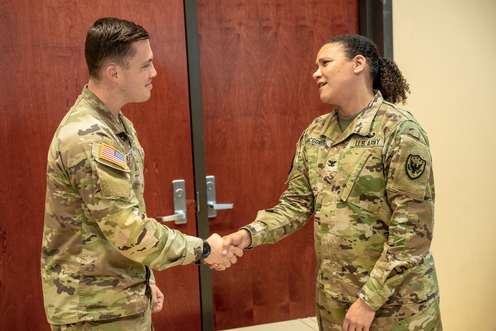 2nd Lt. Matthew Ritchie Receives Coin From Col. McGonegal