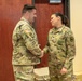 Lt. Col. Michael Fish Receives Coin From Col. McGonegal