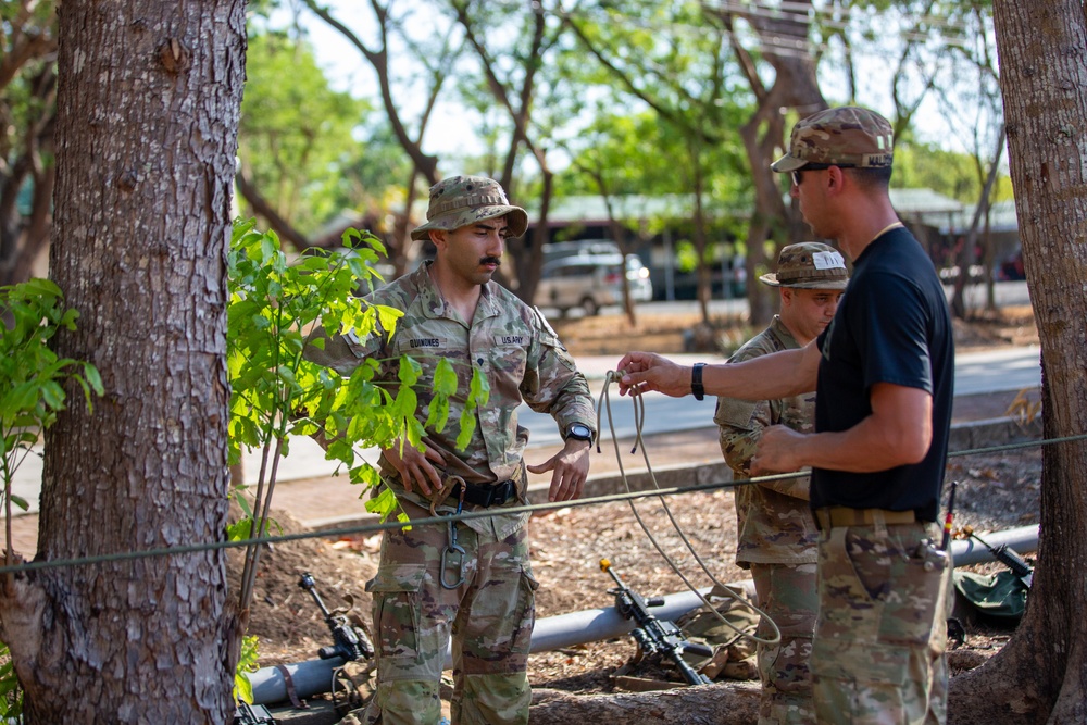 Balikatan 24: Jungle Operations Training Course students conduct water survival, knot tying, and jungle-based tactics