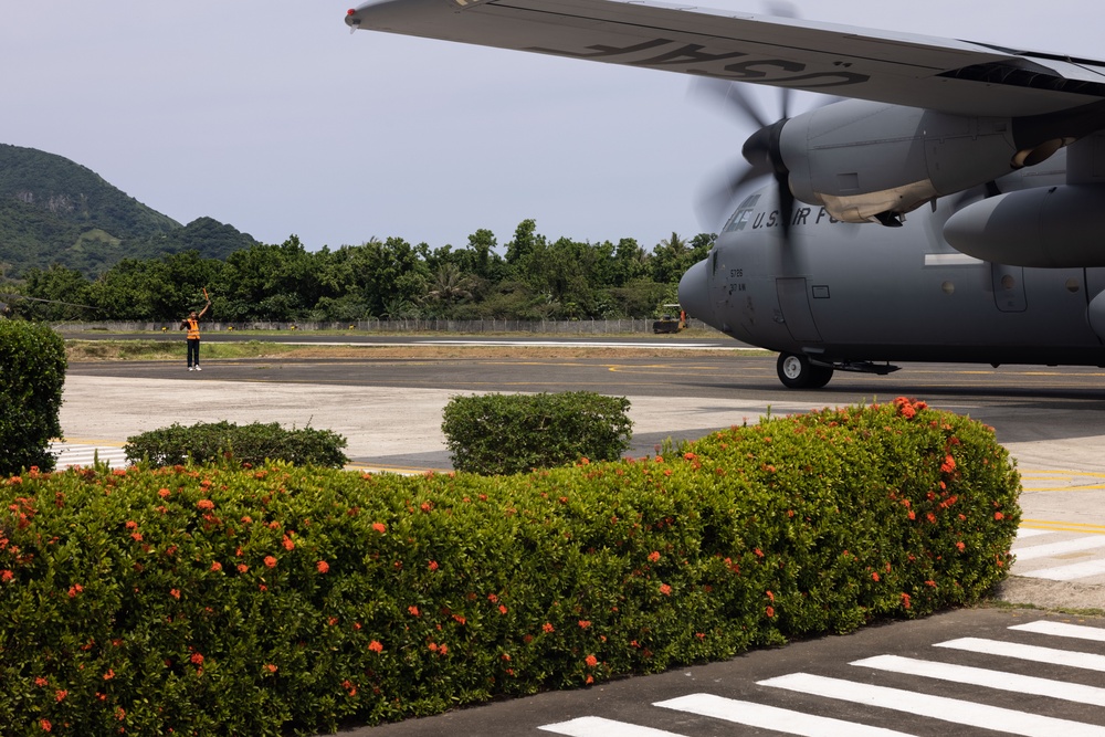 U.S. service members land at Basco airport