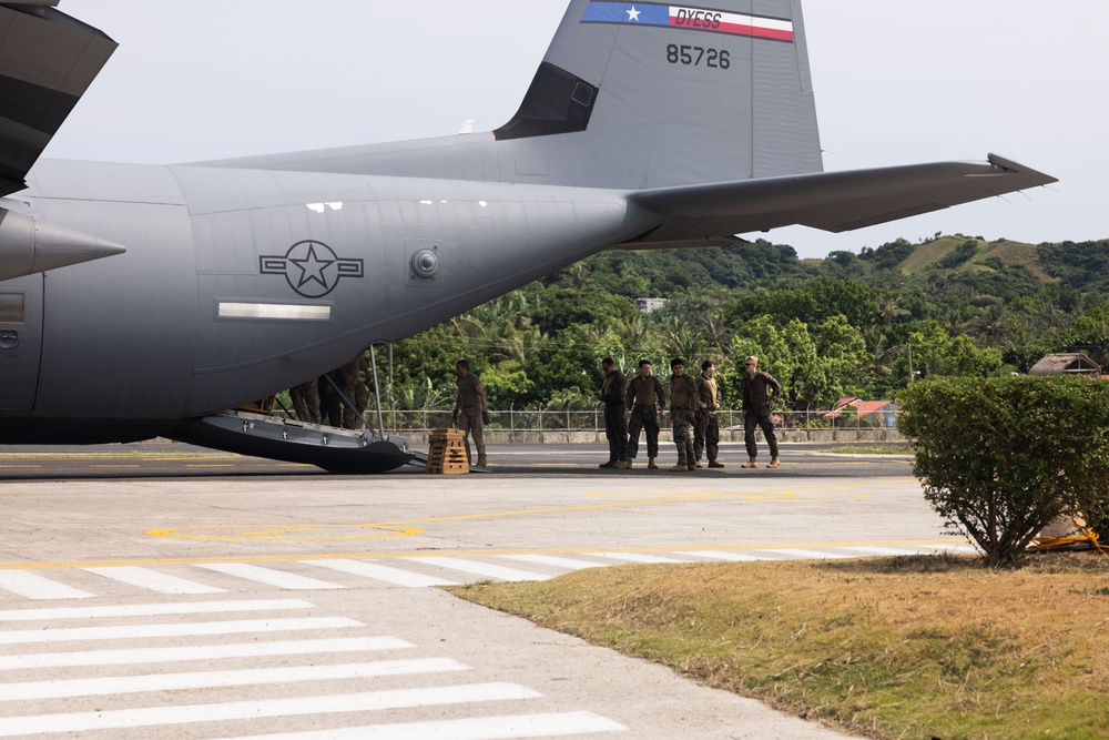 U.S. service members land at Basco airport