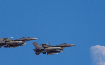 F-16s in a moon-lit Nellis Sky