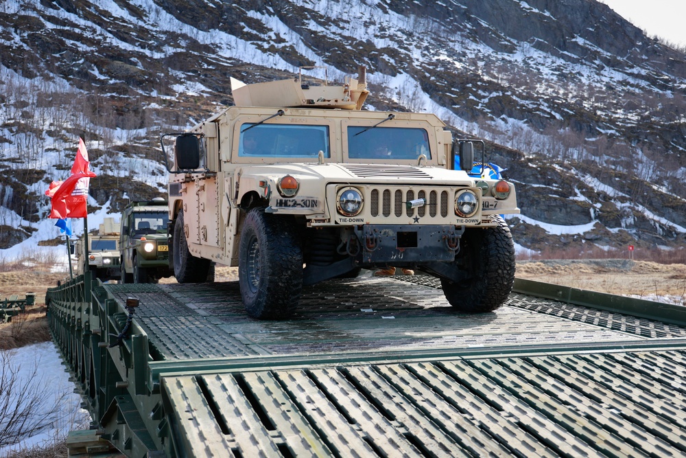 U.S. Navy Seabees join forces with the Army and Norway for bridge construction