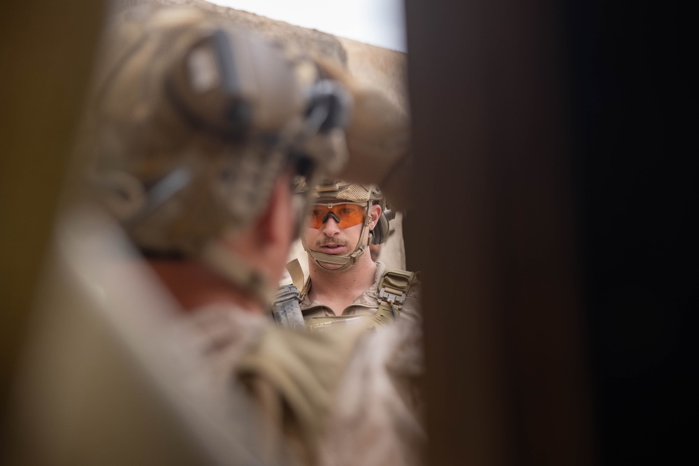 3rd Bn., 4th Marines patrols through infantry immersion trainer