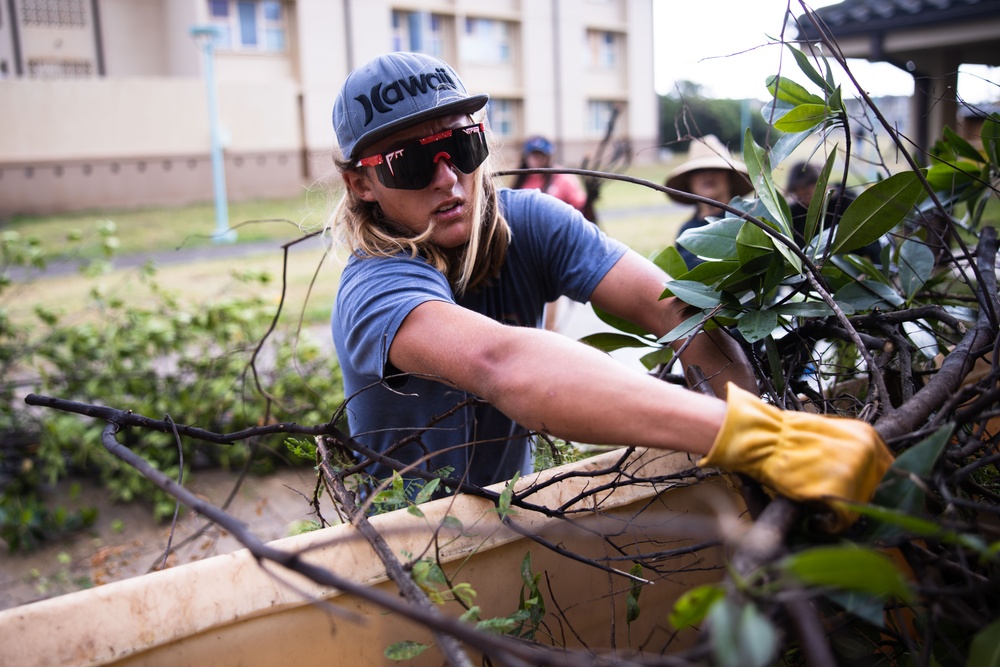 Branching Out: Weed Warriors clear invasive plants and debris from the Mokapu Central Drainage Channel on MCBH