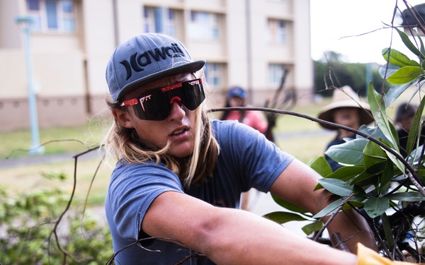 Branching Out: Weed Warriors clear invasive plants and debris from the Mokapu Central Drainage Channel on MCBH