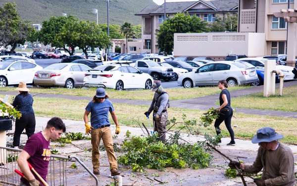 Branching Out: Weed Warriors clear invasive plants and debris from the Mokapu Central Drainage Channel on MCBH