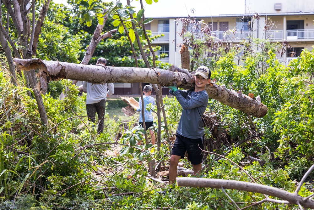 Branching Out: Weed Warriors clear invasive plants and debris from the Mokapu Central Drainage Channel on MCBH